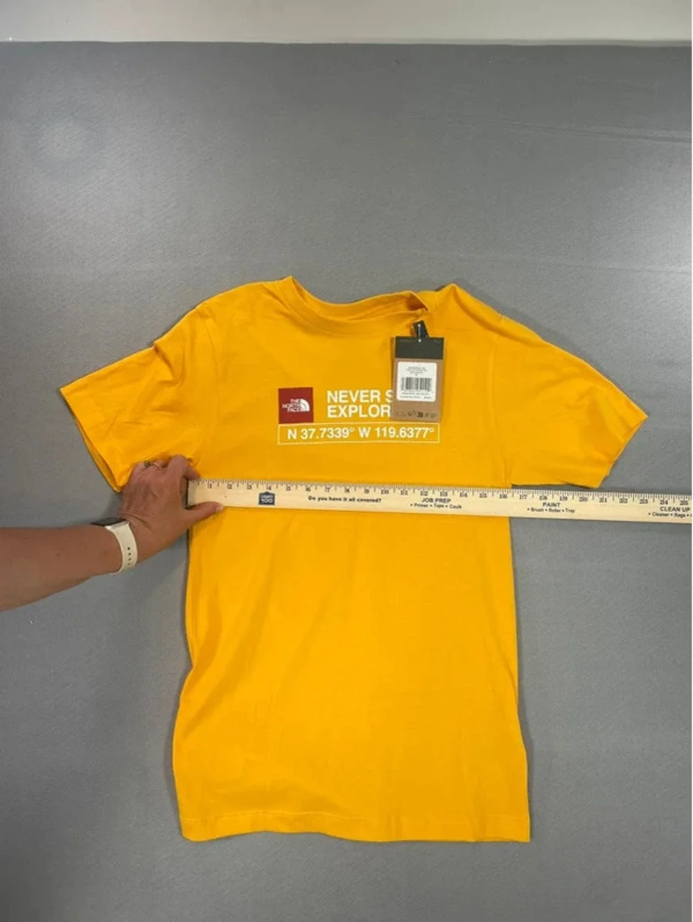 The Northface yellow “Never stop exploring” T-shirt Size XS - Picture 5 of 7